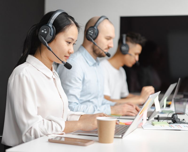 Customer support working on laptop